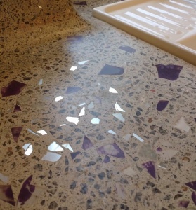 Resin, glass and mirror decoded concrete worktop